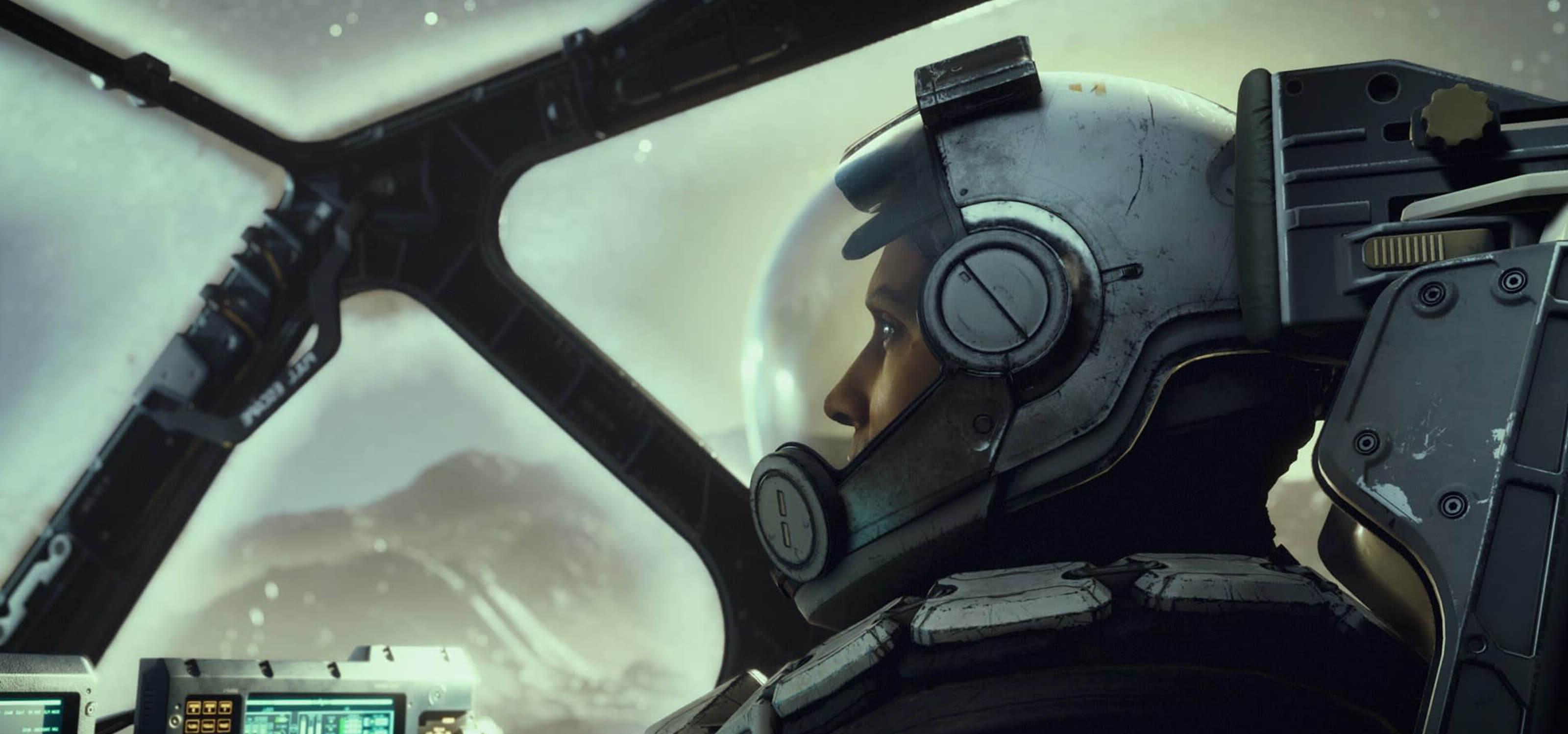 星际的一张截图显示，一名戴着太空头盔的男子从他的飞船驾驶舱向外凝视.