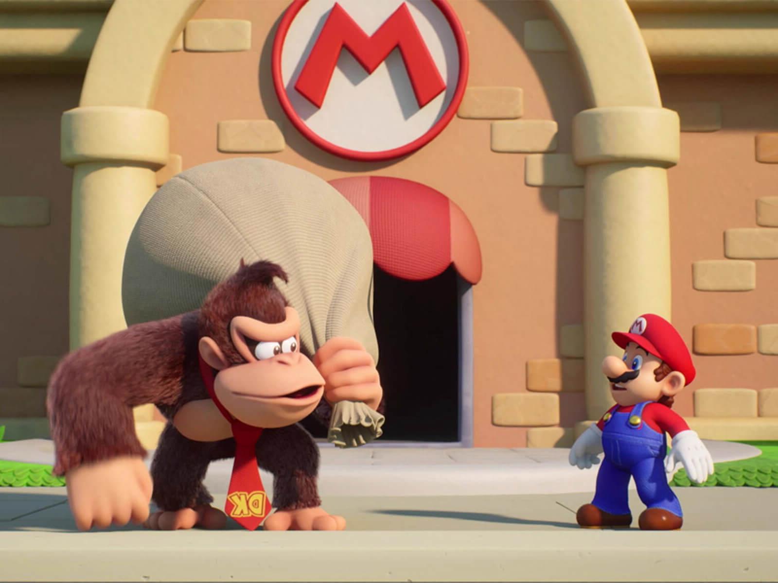 Donkey Kong holds a sack over his shoulder and faces Mario in a screenshot from Mario Vs. 《大金刚.